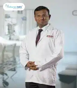 Dr. Satish L
